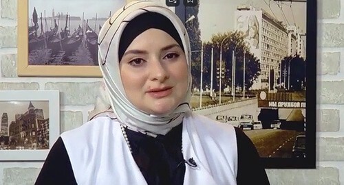 Dina Shagidaeva. Screenshot of the video by ANSAMBLE NOHCHO https://www.youtube.com/watch?v=T40yk9InrNg 