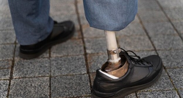 A disabled person. Photo: ru.freepik.com/photos/woman'>Woman photo created by freepik - ru.freepik.com