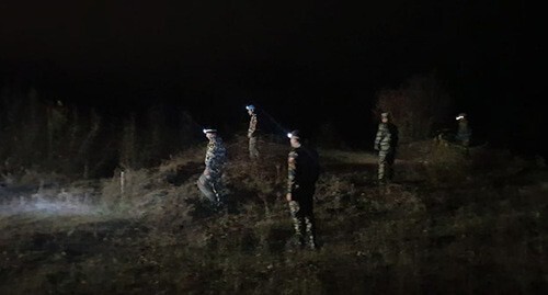 Karabakh rescuers in the course of search for casualties' bodies. Screenshot of the page on Facebook https://www.facebook.com/photo?fbid=266078712204971&amp;set=a.204085831737593