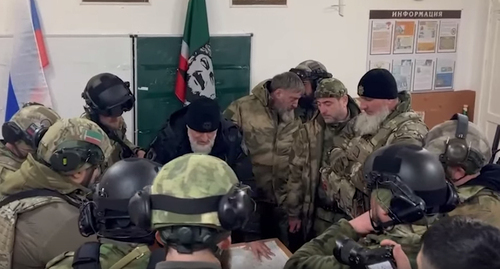 Adam Delimkhanov and Chechen fighters participating in the military operation in Ukraine. Image made from the video posted at Ramzan Kadyrov's VK channel: https://vk.com/ramzan?w=wall279938622_777991