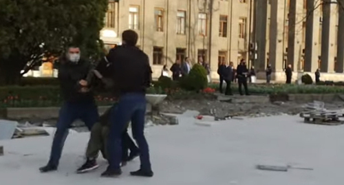 Police detain participants of a rally against the self-isolation regime in Vladikavkaz, 2020. Image made from the video posted by the Caucasian Knot at:  https://www.youtube.com/watch?v=aIxG_fs1r0M&t=1s