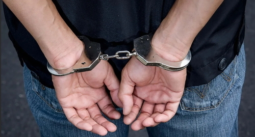 A man in handcuffs. Photo: ru.depositphotos.com