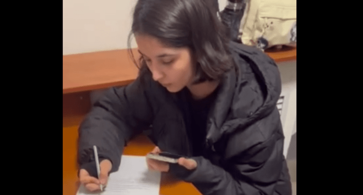 Zaira Pirova at the police station. Screenshot of a video posted by the SK SOS Crisis Group (included into the register of foreign agents) on January 7, 2025 https://t.me/sksosorg/1293