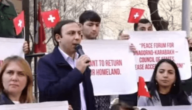 Participants in a protest action held in front of the Swiss Embassy in Yerevan. Screenshot of a photo posted by NewsAm on March 13, 2025 https://news.am/rus/news/871423.html