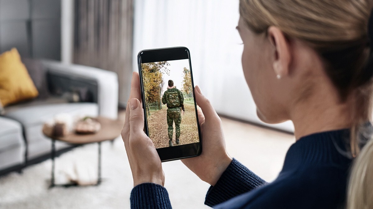 A girl publishes information about armed forces on social media. Picture made in Photoshop by the "Caucasian Knot"