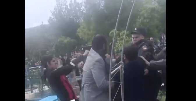 Brawl with law enforcers at a cemetery in Zelenokumsk: still frame from the video of the "Bloknot Stavropol" from April 30, 2025: https://t.me/bloknot_stavropol/33292
