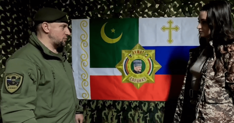 Apti Alaudinov tells a journalist about the “Akhmat” special forces battalion’s flag. A screenshot from the video posted by Anastasia Babir in her Telegram channel on May 23, 2025, https://t.me/SovaBabir/217.