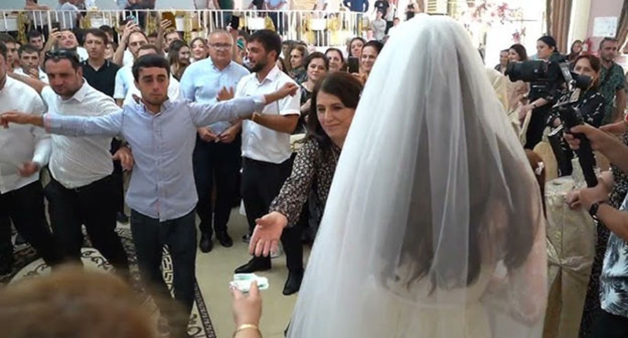 The Wedding. Screenshot of video https://www.youtube.com/watch?v=v29c9BPZqrM