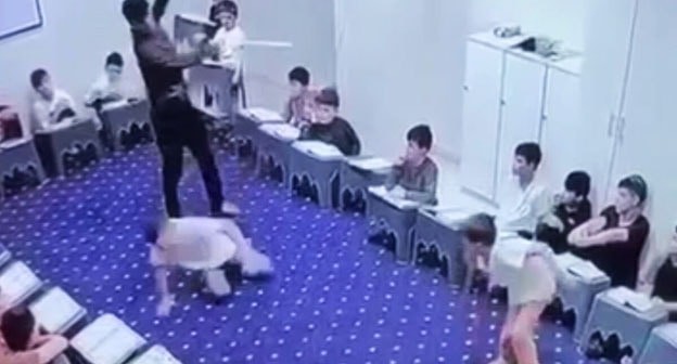 Beating of students of the Hafiz school in Chechnya. July 14, 2025. Screenshot of the video https://www.gazeta.ru/social/news/2025/07/14/26263646.shtml