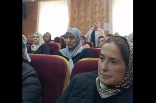 Participants of the meeting in Naurskaya. Still from the "Multinational" video from October 9, 2025, https://t.me/mnogonazi/27123