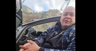 Alan Gatsoev spent almost six months living in a car in the neutral zone. Still from a video posted on the Telegram channel "Ossetia" on November 16, 2025, https://t.me/ossetiaFB/57416.