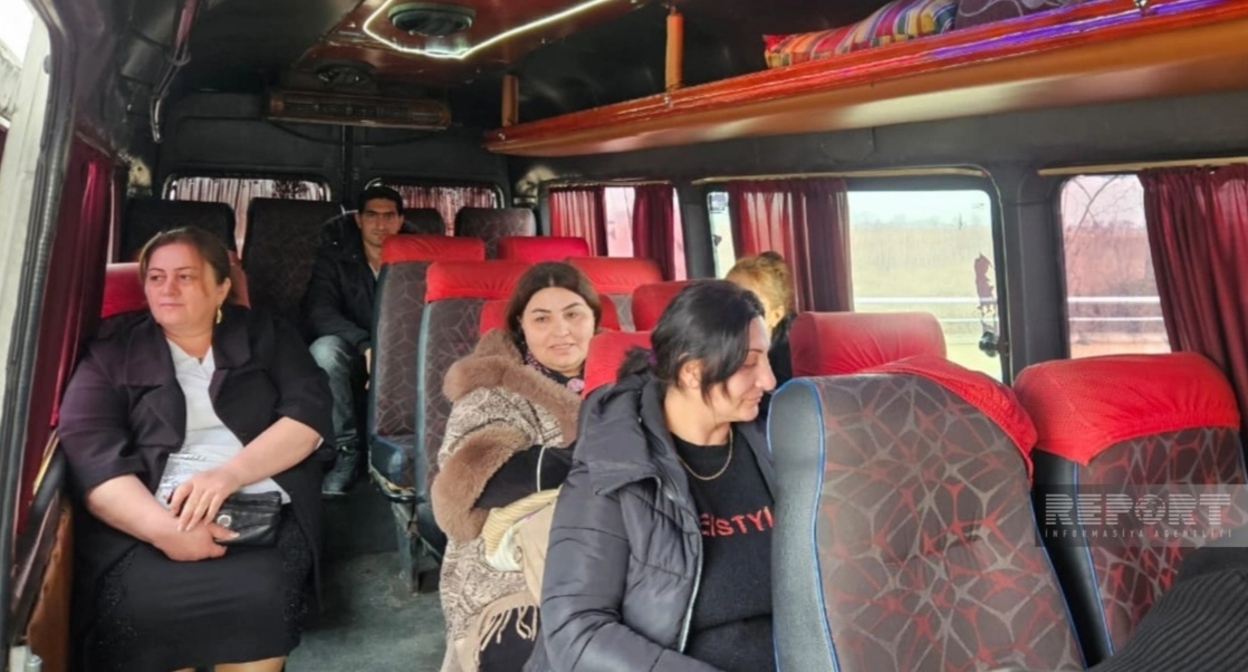 Former internally displaced persons. January 9, 2026. Photo: Report https://report.az/ru/vnutrennyaya-politika/v-4-sela-agderinskogo-rajona-otpravilas-pervaya-gruppa-zhitelej