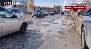 A shot of a potholed road on Zavokzalnaya Street in Khasavyurt. Photo: People's Front Dagestan / Telegram channel