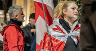Activists outside the parliament building. Screenshot from Publika photo from March 21, 2026, https://www.facebook.com/photo?fbid=1711578323575044&set=pb.100041686795244.-2207520000 (Meta, the company that owns the social network, is banned in Russia).