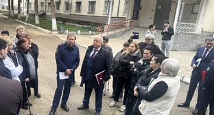 Andrei Fishman meets with dormitory residents in Nalchik. Photo: Investigative Committee of Kabardino-Balkaria / Telegram