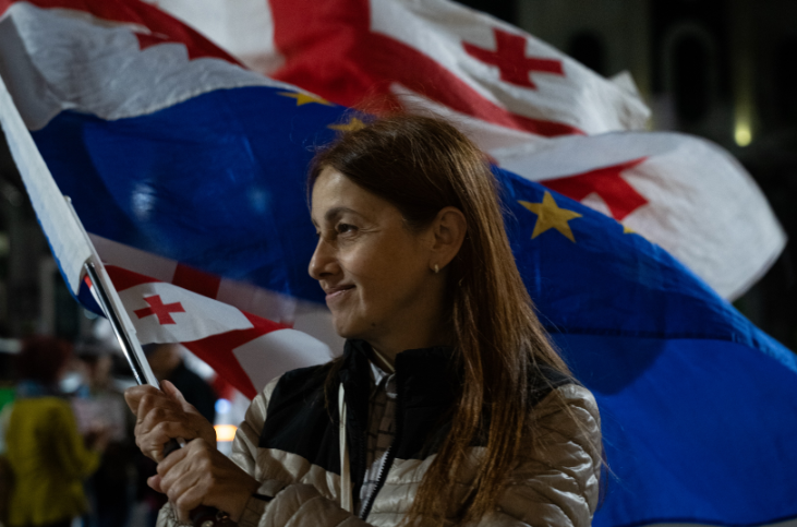A protester at the Georgian Parliament. Screenshot from Publika's photo from May 27, 2026, https://www.facebook.com/photo?fbid=1769447167788159&set=pcb.1769447274454815