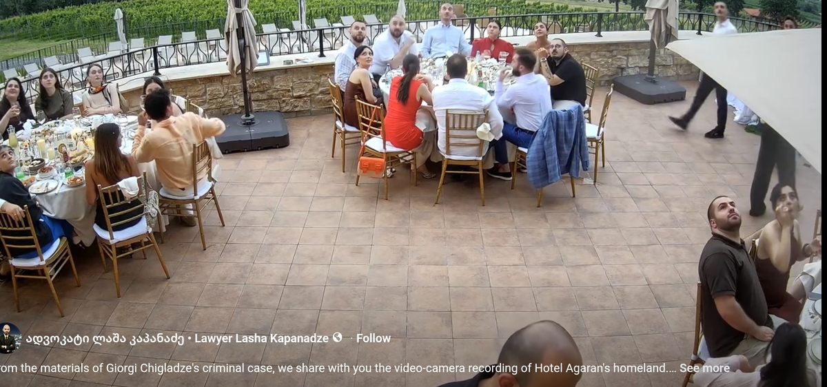 Wedding participants look up after the shouts from the balcony. Screenshot from Lasha Kapanadze's publication. Wedding participants look up after the shouts from the balcony. Screenshot from Lasha Kapanadze's publication.