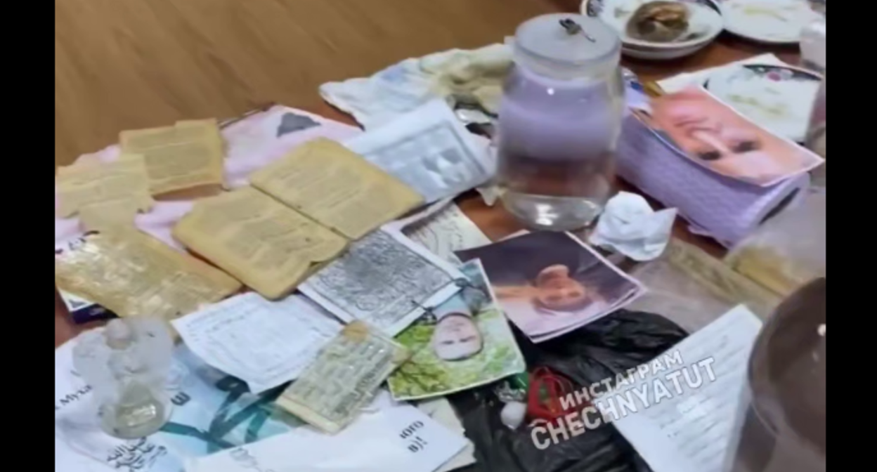 Items seized from fortunetellers. Frame from the video "Tut Chechnya" from 07.08.26, https://t.me/tutchechnya/8185.