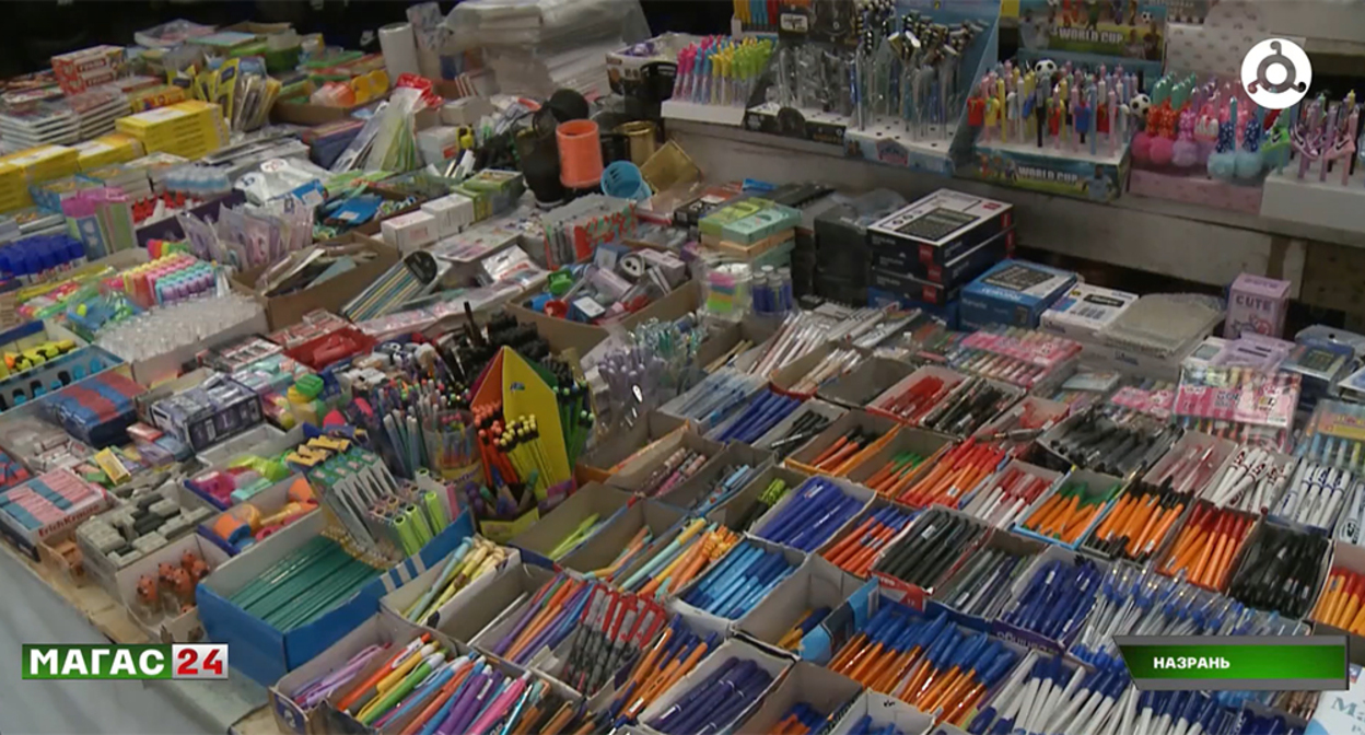 Stationery at the market in Nazran. Frame from the video report of the "Magas" TV channel https://magas.tv/news/skolnyi-soping-po-ingusski-kak-sobrat-rebenka-k-1-sentiabria-i-ne-razoritsia?utm_source=chatgpt.com