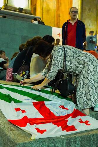 Supporters of Eurointegration in Tbilisi on the 645th day of continuous protests leave memorial inscriptions on the flag of Abkhazia. September 3, 2026. Photo MO SE/ Facebook - owned by Meta, whose activities are banned in Russia Supporters of Eurointegration in Tbilisi on the 645th day of continuous protests leave memorial inscriptions on the flag of Abkhazia. September 3, 2026. Photo MO SE/ Facebook - owned by Meta, whose activities are banned in Russia