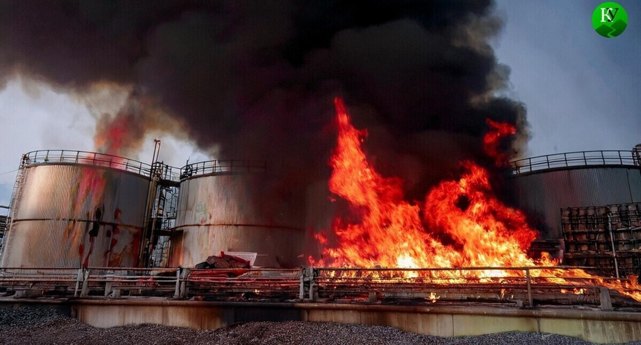 Fire at the oil depot. Illustration created by "Caucasian Knot" using AI in Photoshop. Fire at the oil depot. Illustration created by "Caucasian Knot" using AI in Photoshop.